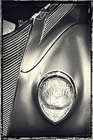 A 1937 Ford right side front end with shadows and highlights